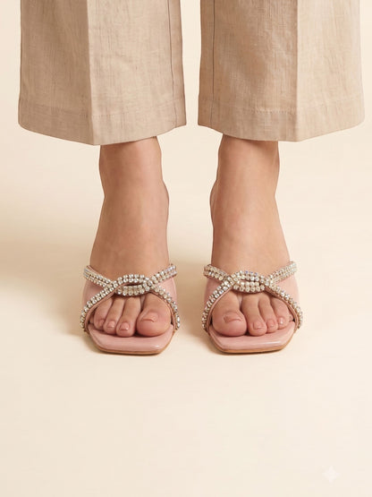 Runway Stores blush pink square-toe slide sandals with crystal-embellished crisscross straps and block heels.