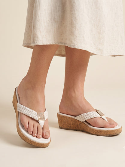 Runway Stores white braided strap thong wedge sandals with a cork heel and shimmering square embellishment