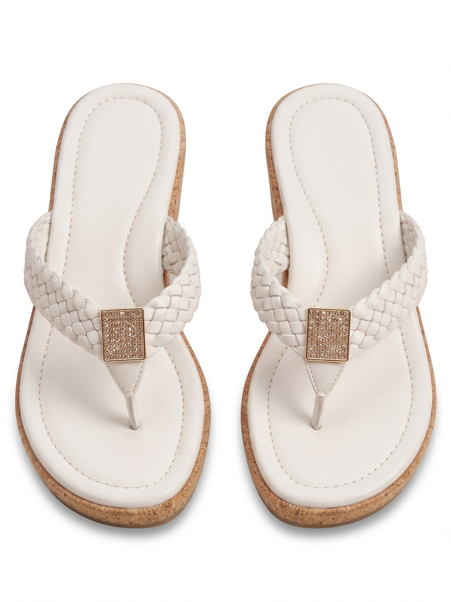 Runway Stores white braided strap thong sandals with a cork wedge heel and a shimmering square embellishment.