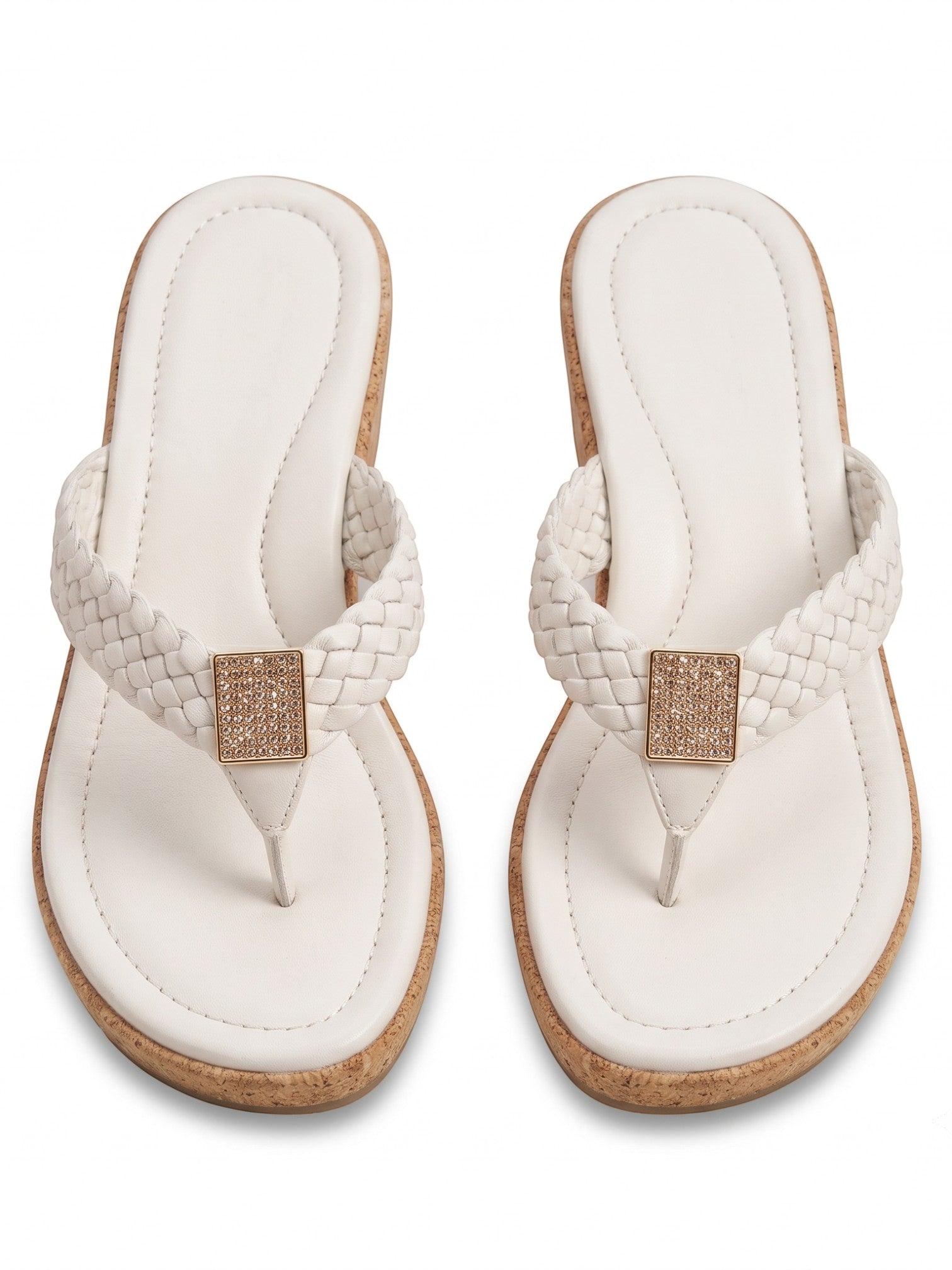Runway Stores white braided strap thong sandals with a cork wedge heel and a shimmering square embellishment.